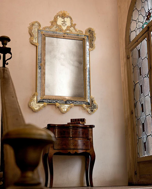 Authentic Murano Glass Mirror styled above a classic console—handcrafted Venetian glasswork that adds timeless luxury and reflects light beautifully.